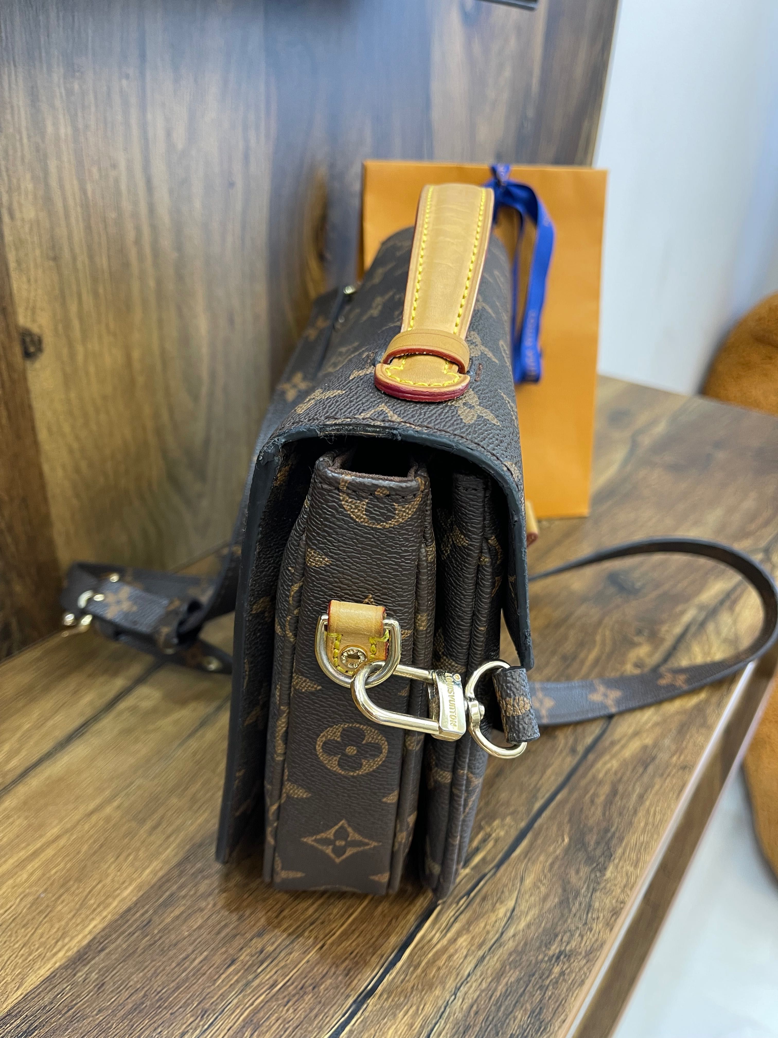 Сумка Louis Vuitton