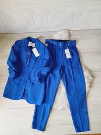 Piękny kobaltowym garnitur damski elegancki spodnie w kant SM