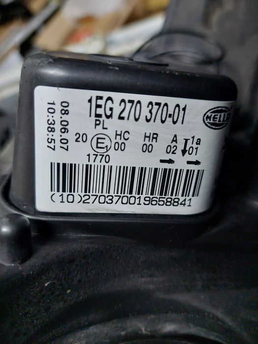 farol esq Opel Astra h