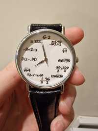 Годинник на руку з математичними формулами