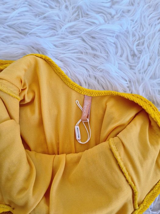 Nelly L 40 strój kąpielowy jednoczęściowy kostium mocno wycięty prążki