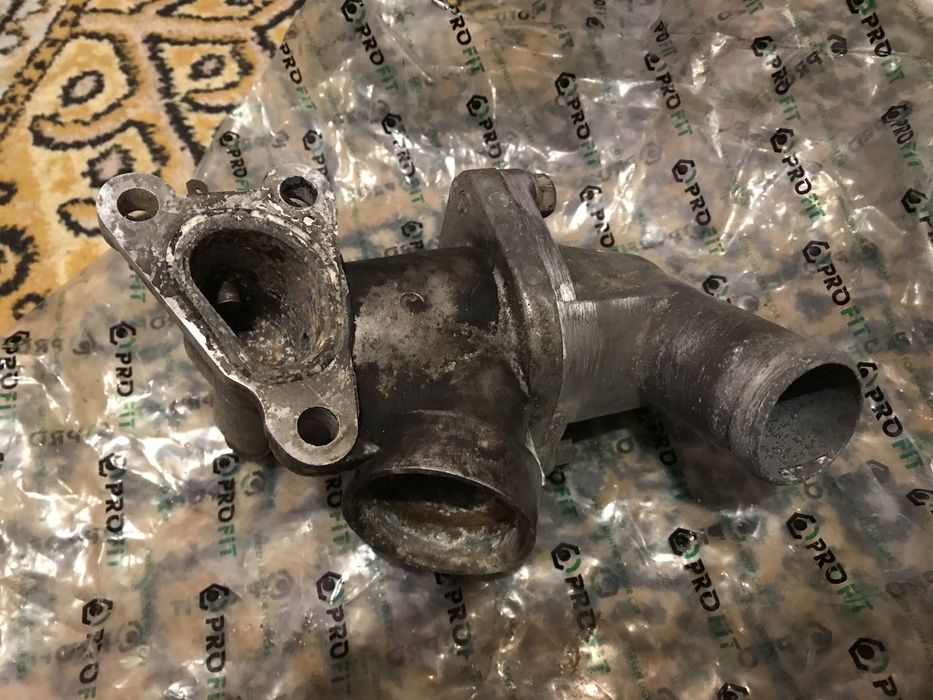 Термостат с корпусом на Чери Тигго