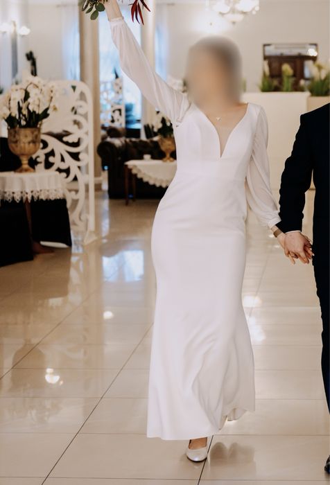 Elegancka dopasowana suknia ślubna