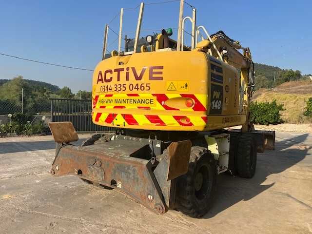 komatsu PW148-10