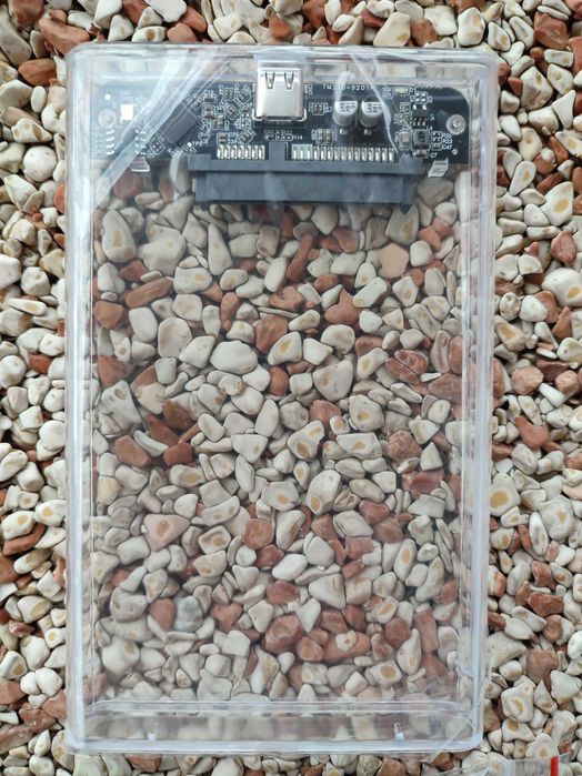 Dwie obudowy na dyski 2,5'' SSD, HDD. Ze złączem USB-C. Przeźroczyste.