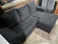Sofa preto em tecido