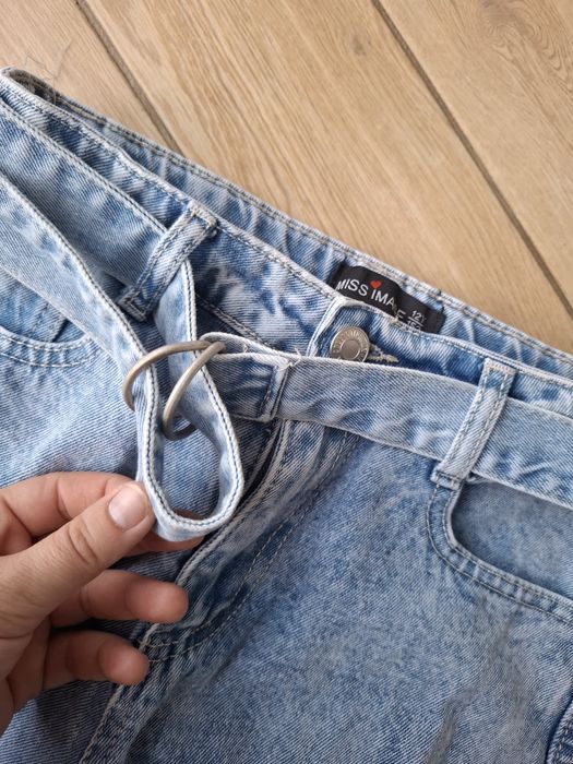 Jeansy  , szerokie z dziurami 152