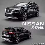 Коллекционная модель автомобиля Nissan X - Trail размер 1/32