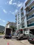 Elevador exterior (grua)plataforma. liftservice . Mudanças, obras,..