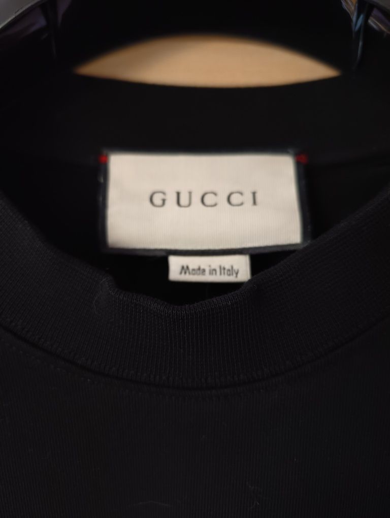 Koszulka Gucci. Motyw logo Blade.