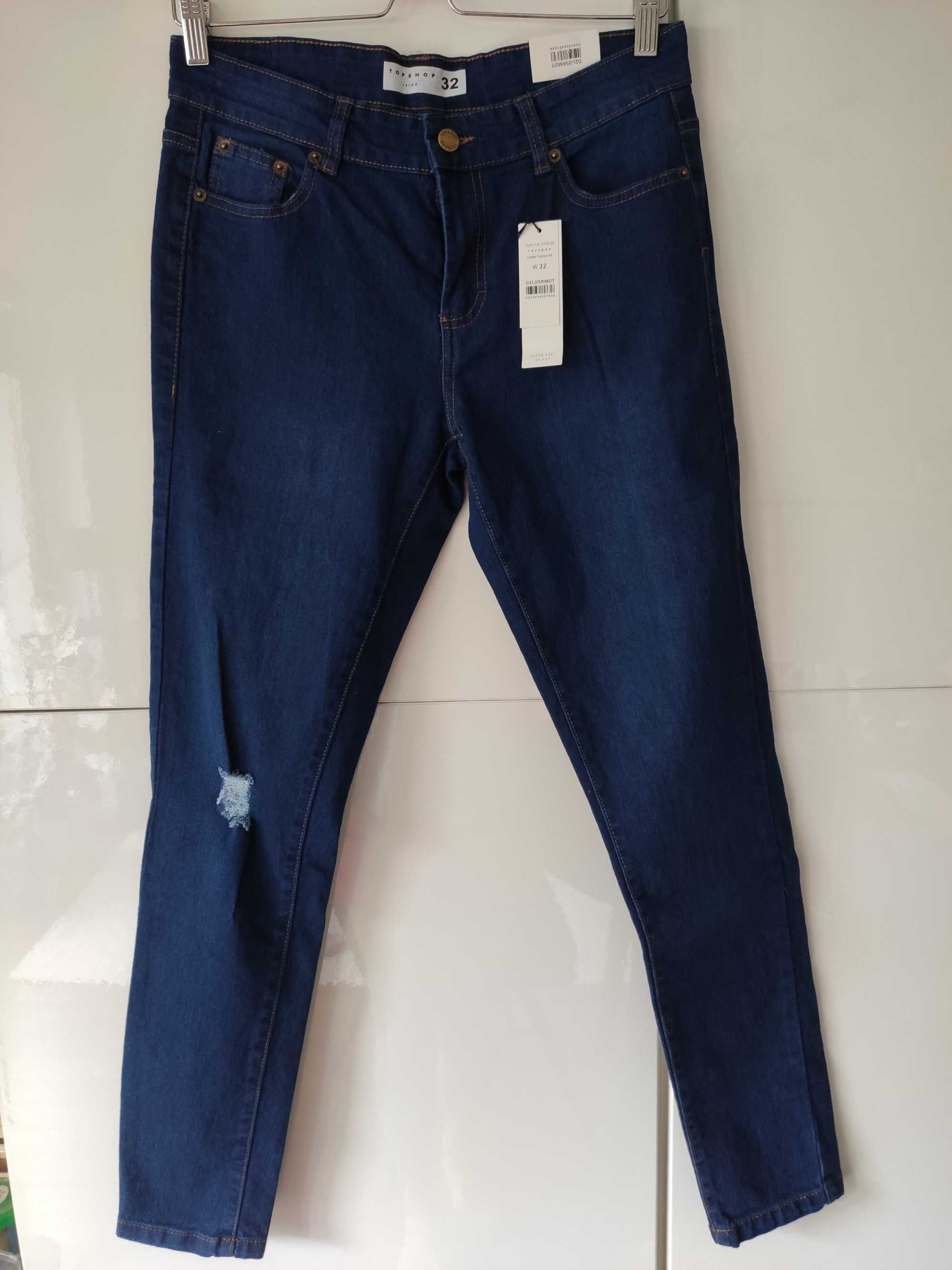 Nowe spodnie jeansy ze zwężanymi nogawkami Topshop rozmiar W32