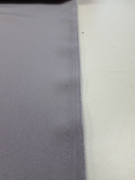 Tkanina jasny popiel szer.152 cm.