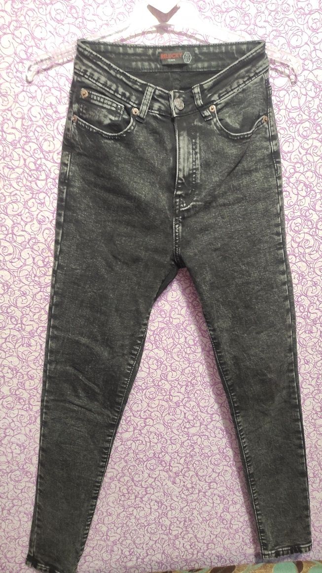 Жіночі сірі джинси на байці 25 .42