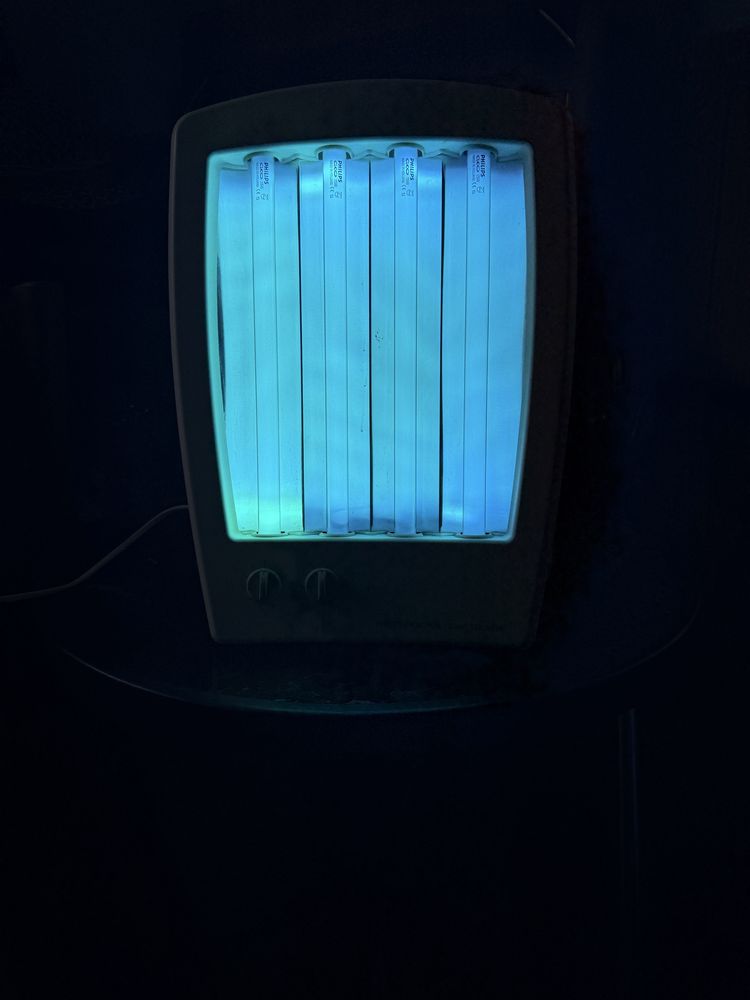 Solarium na twarz i dekold Philips