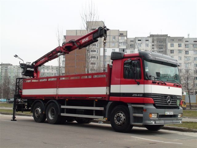 Грузоперевозки машинами с краном-манипулятором и длинномерами 22 тонны