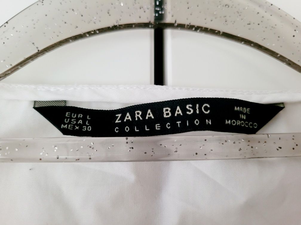 Biała bluzka Zara z dekoltem w serek