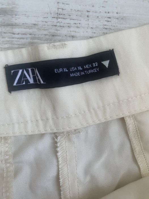 Штани білі кльошні zara