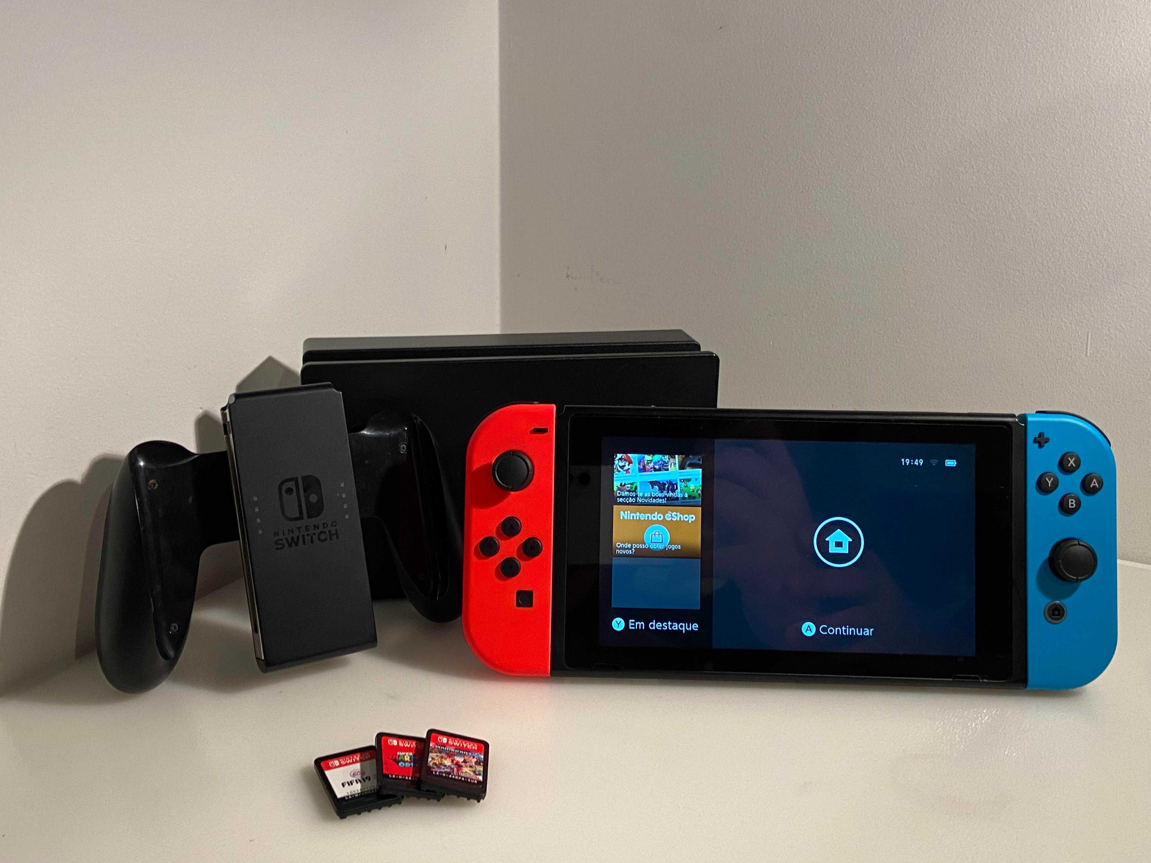 Nintendo Switch com jogos e mala para a consola