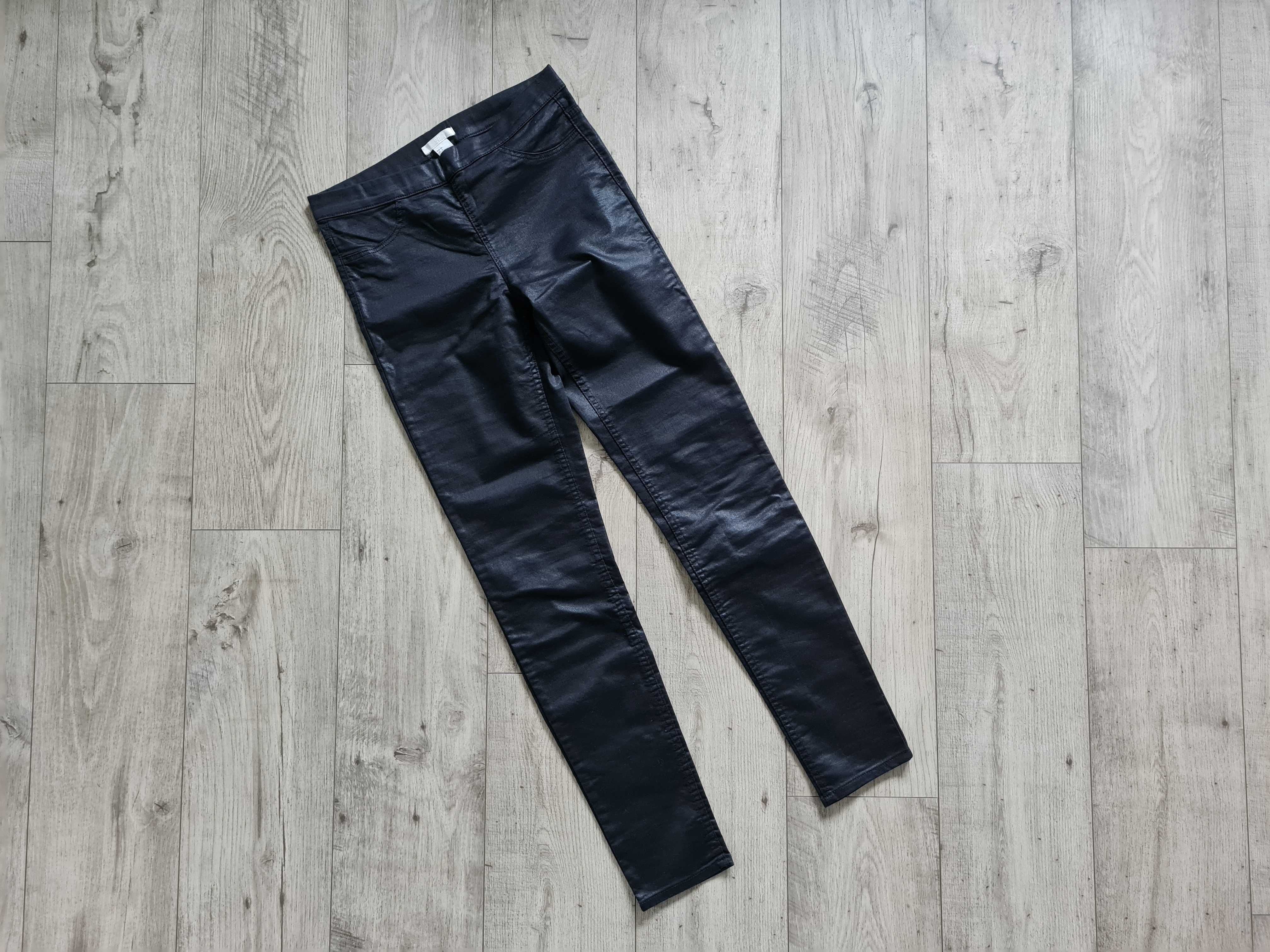 Spodnie jegginsy z połyskiem czarne H&M 36/S