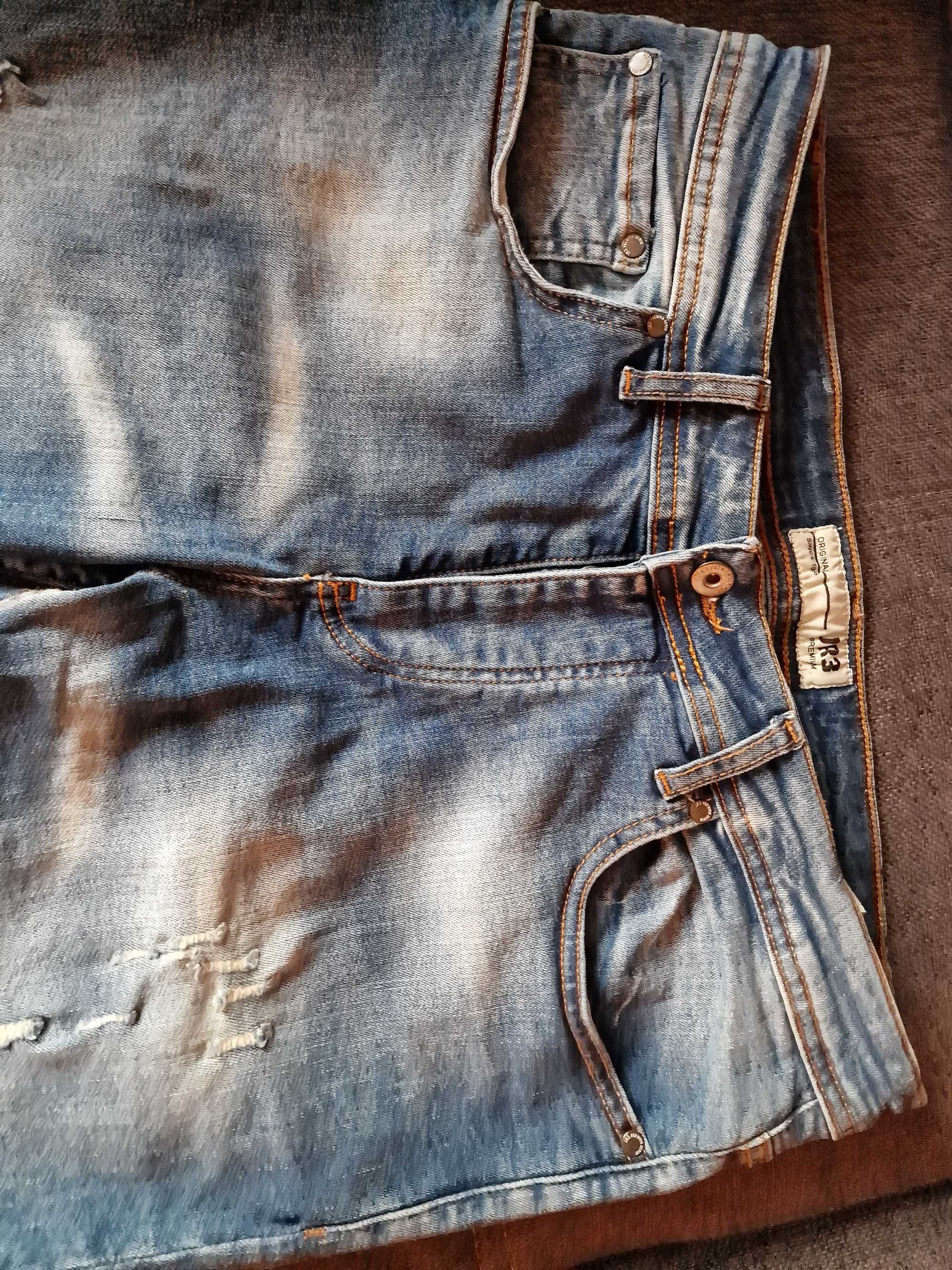 Spodnie jeansowe slim fit z dziurami