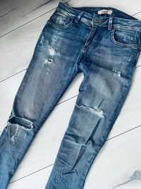 Bershka jeansy przetarcia dziury push up r. 38 M