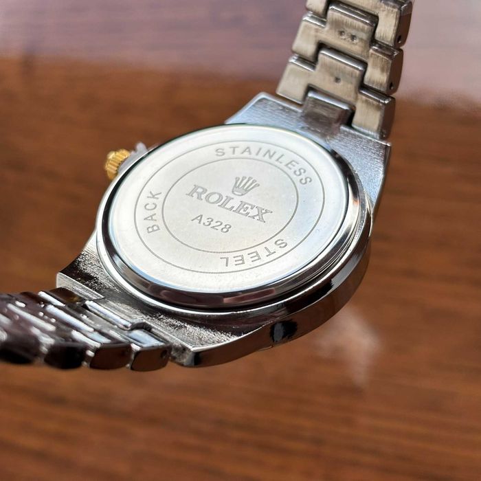 Жіночий годинник Rolex на браслеті комбінованого кольору з датою