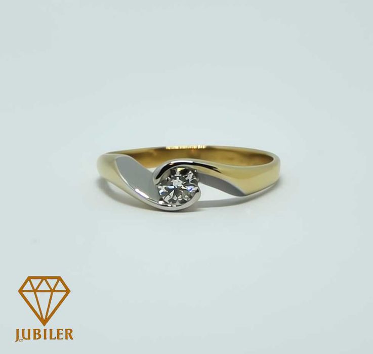Złoty pierścionek z brylantem 585/0,25ct/certyfikat Jubiler GT