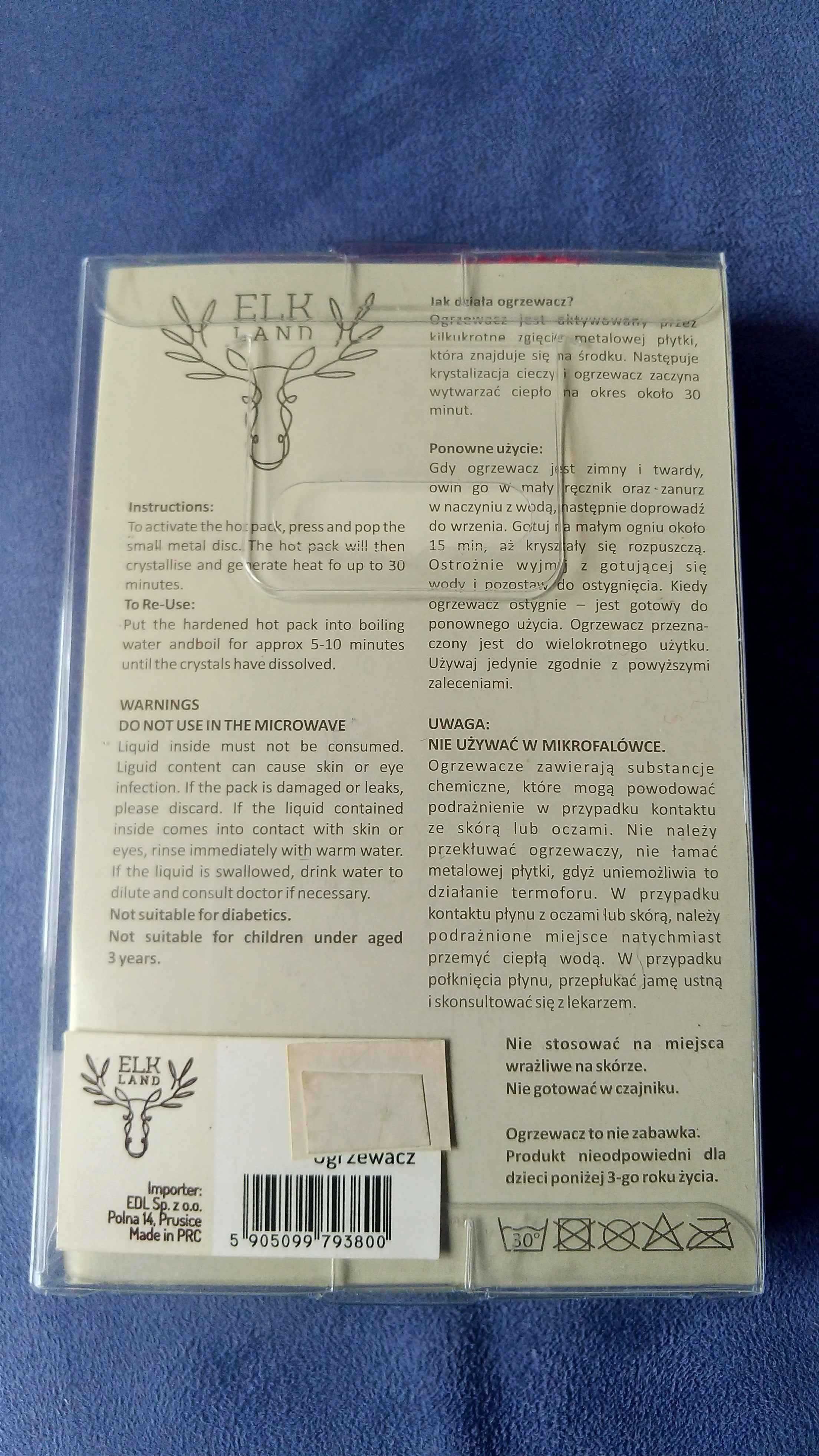 Nowy uroczy ogrzewacz do rąk pingwin w czerwonym szaliku świąteczny