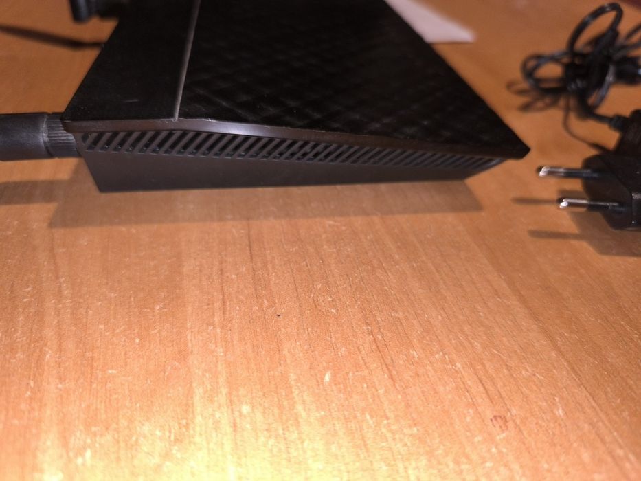 Маршрутизатор / Роутер ASUS RT-N12. - фото 1 - id-p2035918202
Маршрути