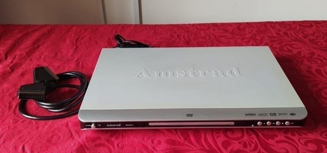 LeitorLeitor de DVD Amstrad DX4015

- Cabo de ligação à T.V.
- Sem com