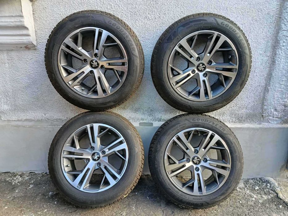 Продам легкосплавні диски з зимовою резиною goodyear ultragrip 185.65.