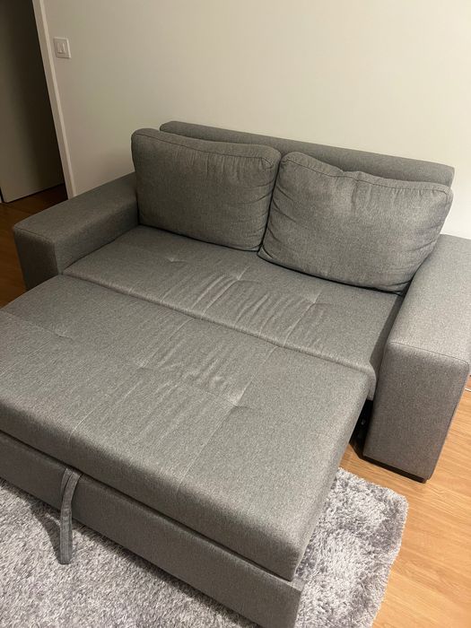 Sofá-cama cinzento