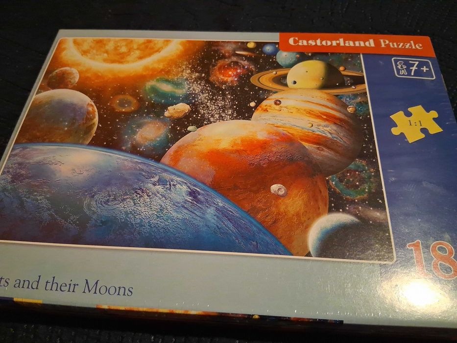 Castorland puzzle 180 planety i ich księżyce