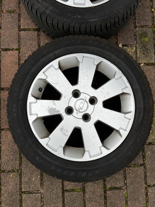Opony wielosezonowe Dębica Navigator 3 + alufelgi oryginalne Opel 15’
