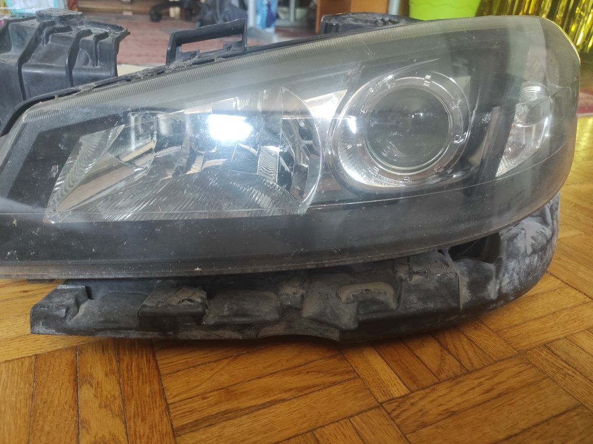 Reflektor Xenon lewy laguna 2 FL 2006