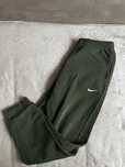 Zielone spodnie dresy Nike