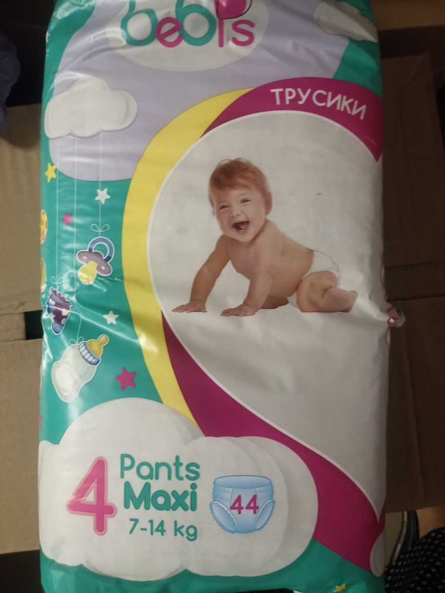 Продам трусики и подгузники Бебис
