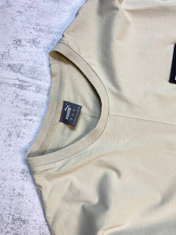 Бежева футболка PUMA Fusion Tee у мінімалістичному стилі