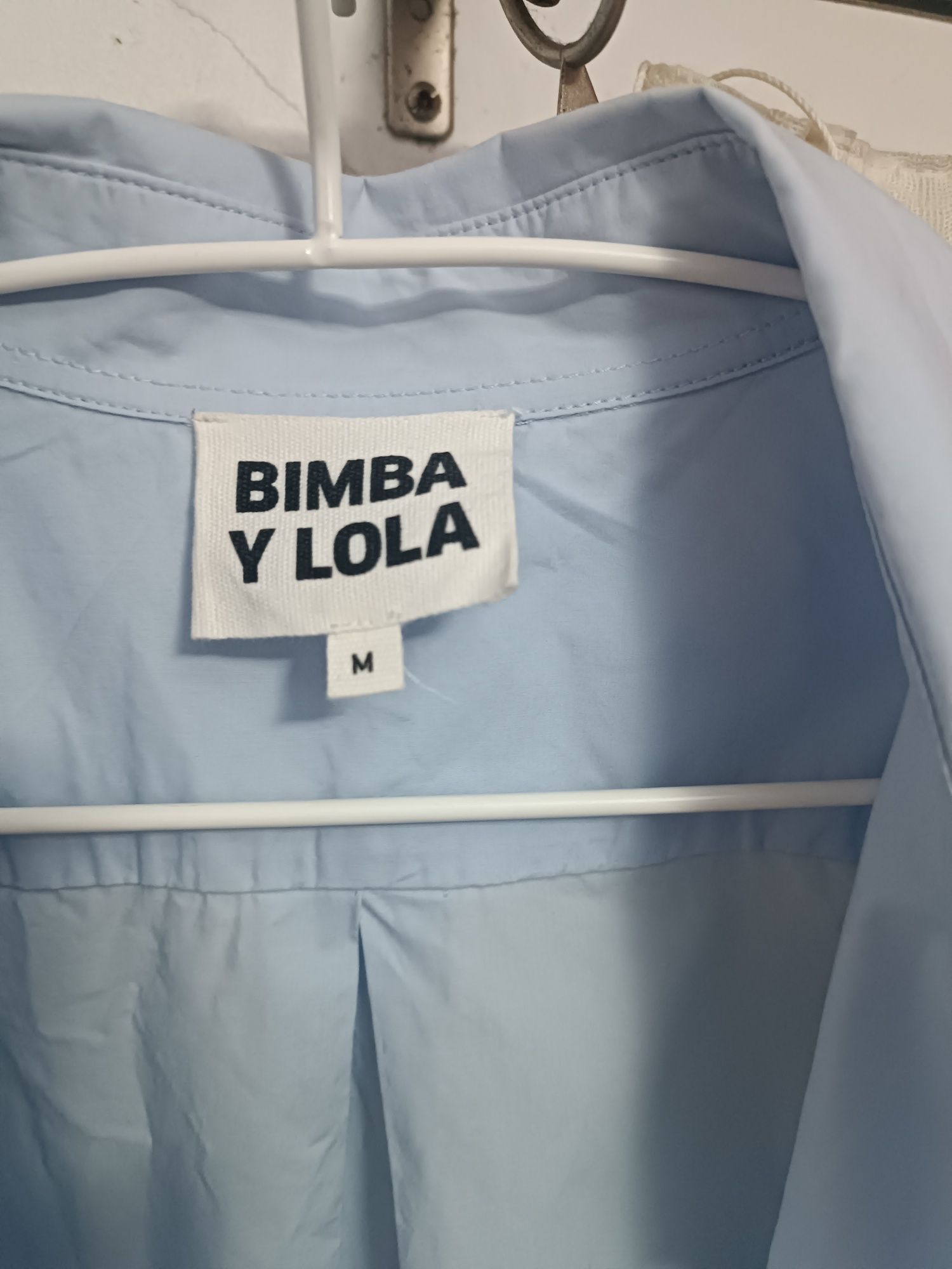 Camisa de senhora