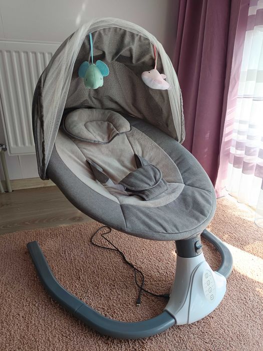 Дитяча електрична гойдалка