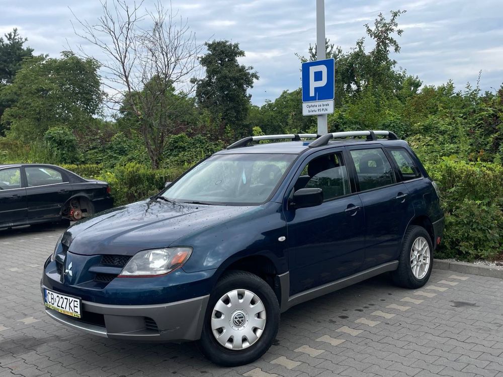 Mitsubishi Outlander 2.0 LPG//4x4//dobry stan//alysu//nowe czesci//