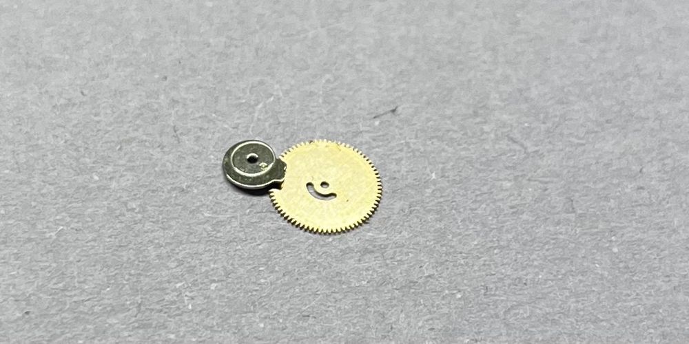 Omega 1002 Seamaster DeVille przerzutnik daty, koło