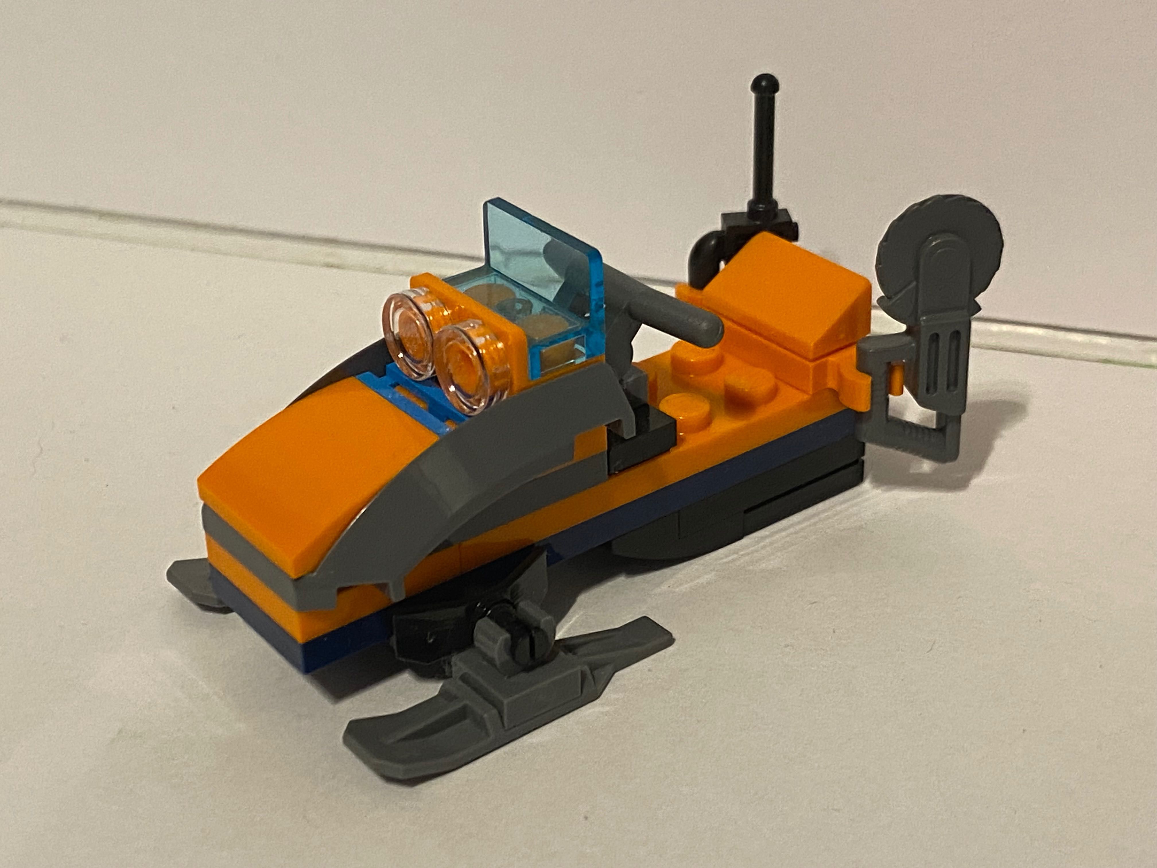 Lego City figurka + pojazd skuter śnieżny stan bdb