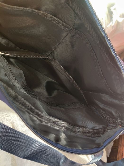 Нейлонова зручна сумка з великою кількість карманів