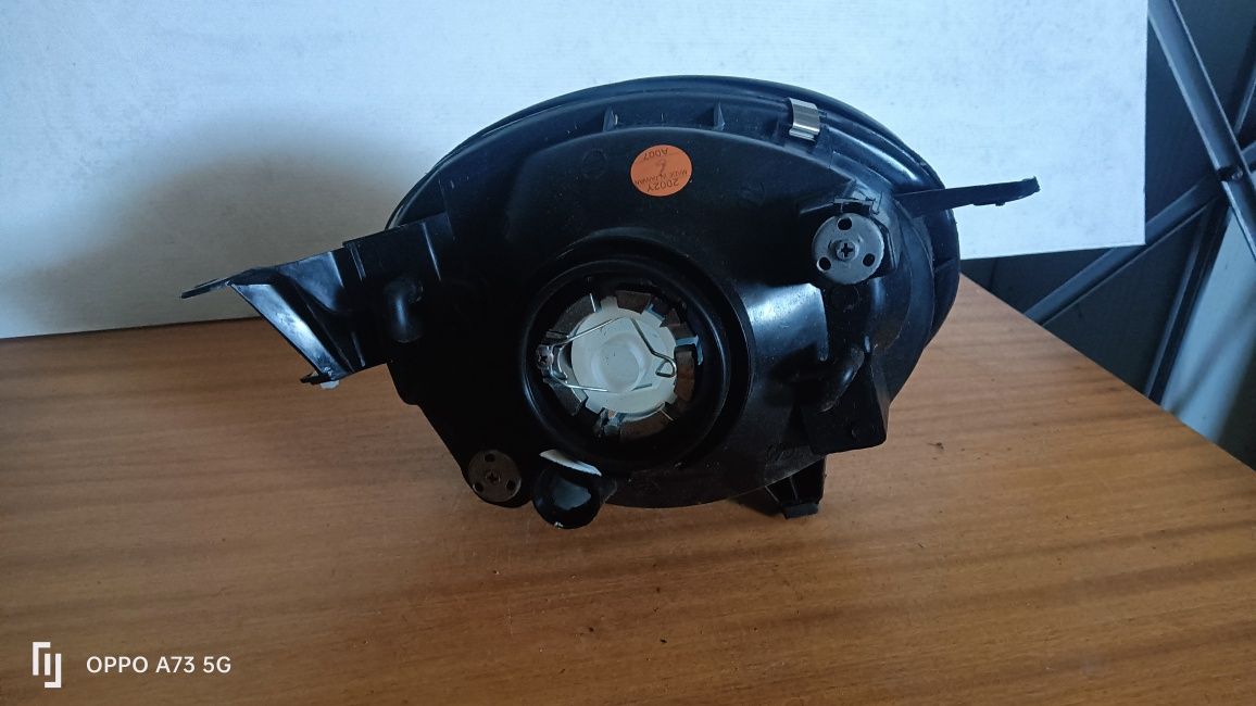Farol Toyota Corolla ótica 1998 esquerda