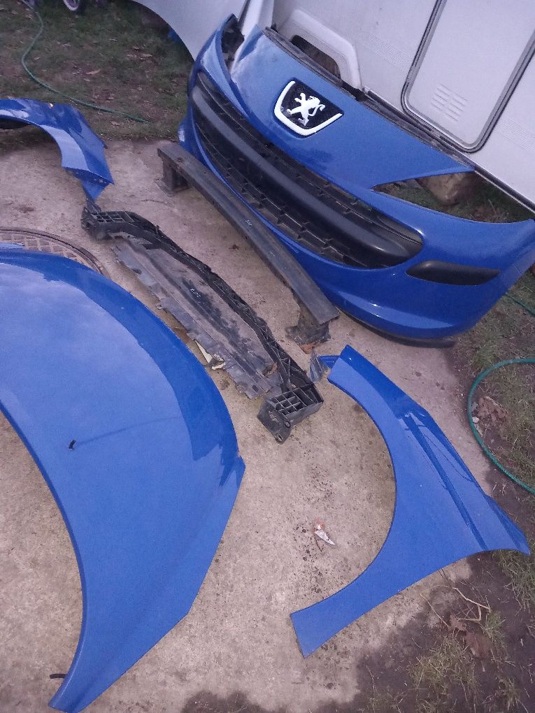 Zderzak maska błotniki pas peugeot 207