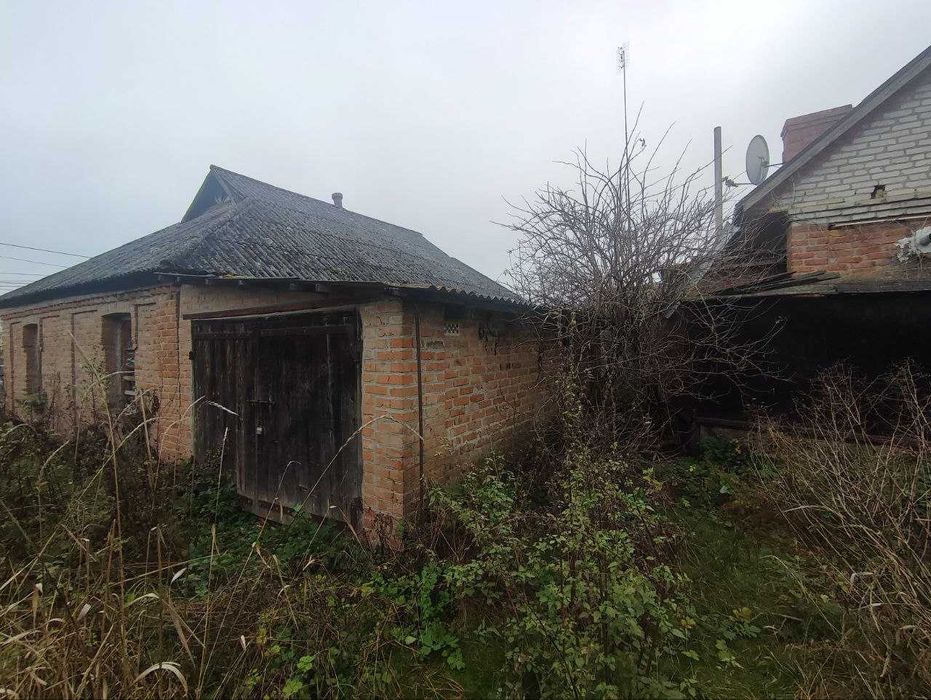Продаж будинку з земельною ділянкою 15с