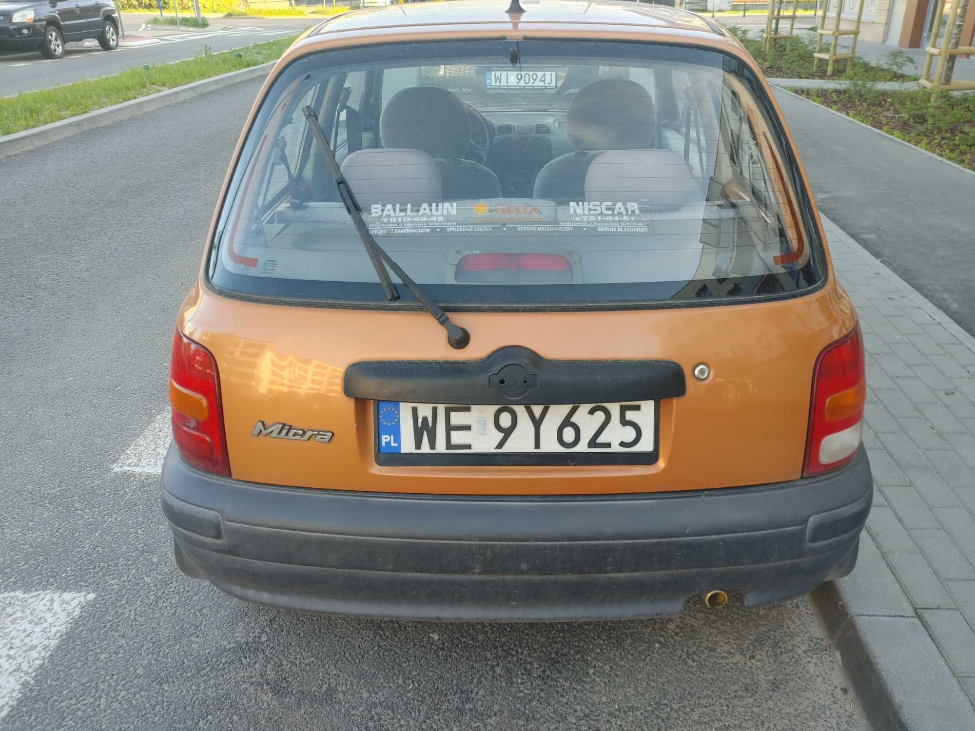 Nissan Micra 1.0 pomarańczowy