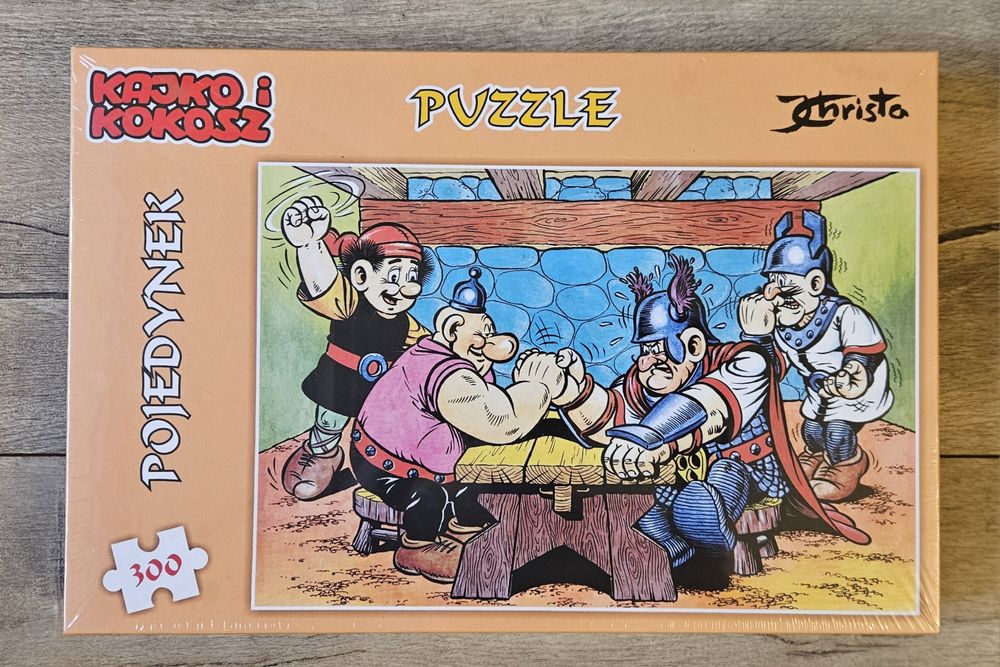 UNIKAT! Puzzle 300 KAJKO I KOKOSZ Pojedynek! J.Christa