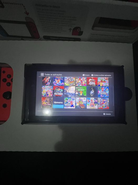 Nintendo switch v1 +256gb 20 jogos